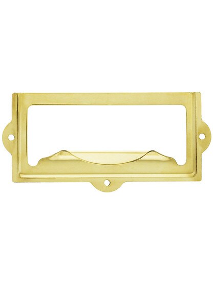3 1/2 inch Stamped Brass Label Holder and Pull in Unlacquered Brass.